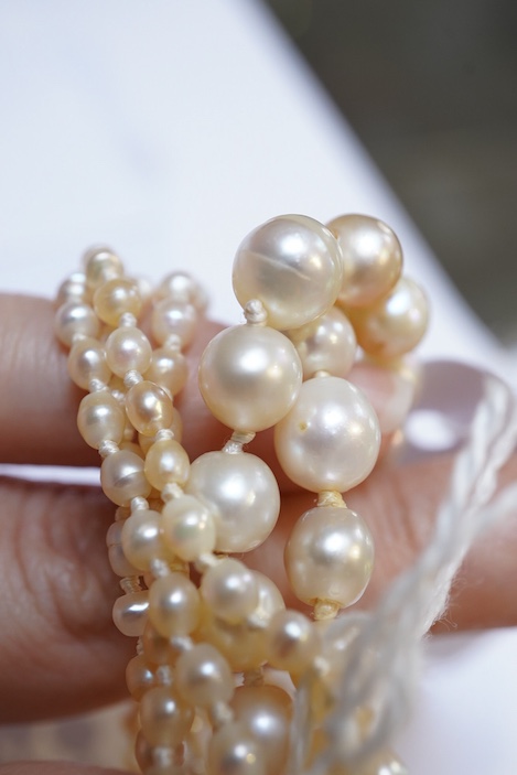 A natural pearl and diamond necklace, early 20th century